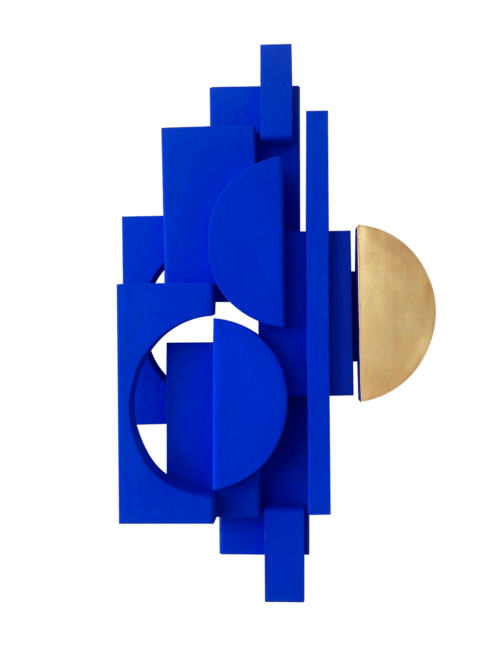 Blue object with brass image